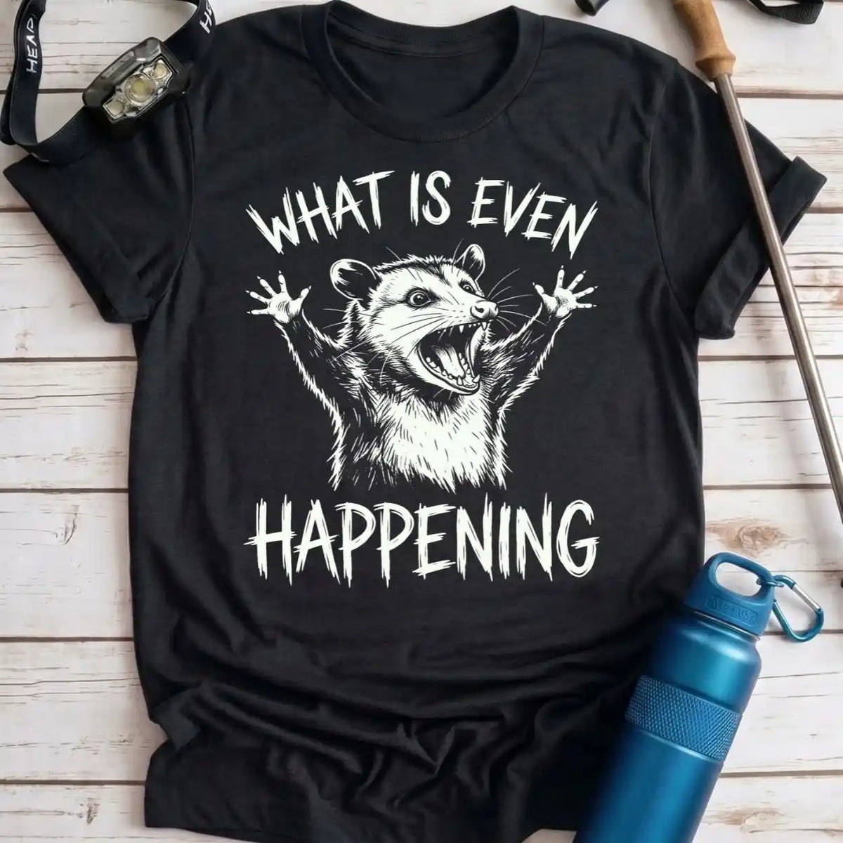 What Is Happening Opossum Tee